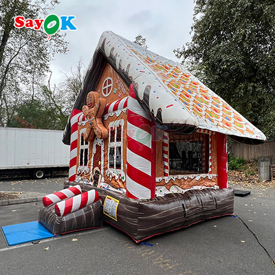 Desain 3D Gratis 0.55mm PVC Tarpaulin Natal Inflatable Bouncing Castle Gingerbread Bounce House dengan Blower