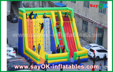 Adult Inflatable Slide 9.5*7.5*6.5m Warna-warni Inflatable Bouncer Slide Dengan Mendaki Dinding Untuk Taman Hiburan