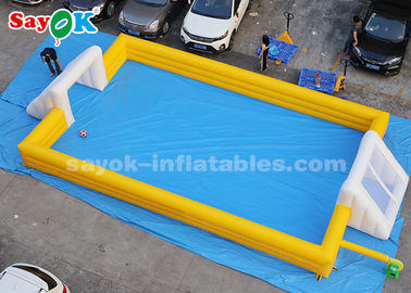 Sepak Bola Tiup Raksasa 12 * 6m Kuning PVC Permainan Olahraga Tiup Lapangan Sepak Bola Tiup