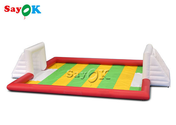 Permainan Pesta Tiup 10x7m Merah Pvc Permainan Olahraga Tiup Karnaval Meledakkan Lapangan Sepak Bola